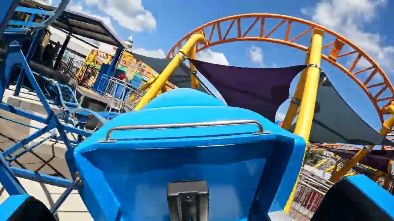 Children riding the Little Nipper shark coaster at Luna Park Sydney