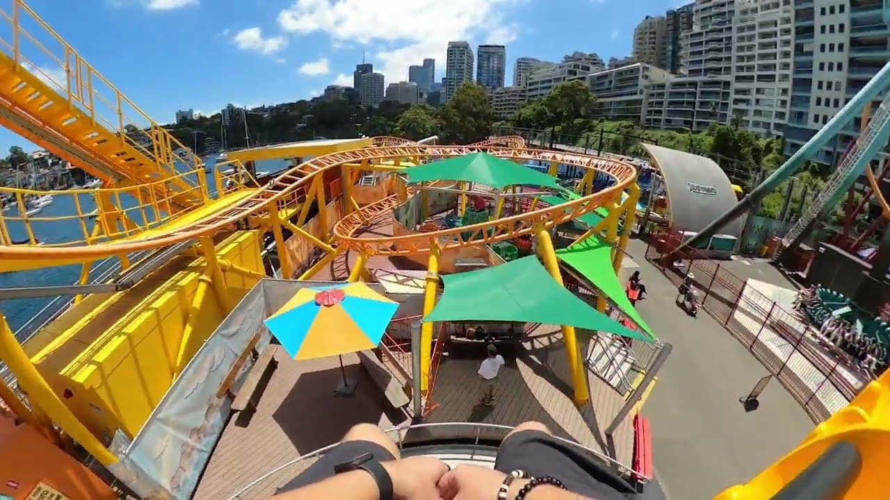 A family on the Loopy Lighthouse ride at Luna Park Sydney